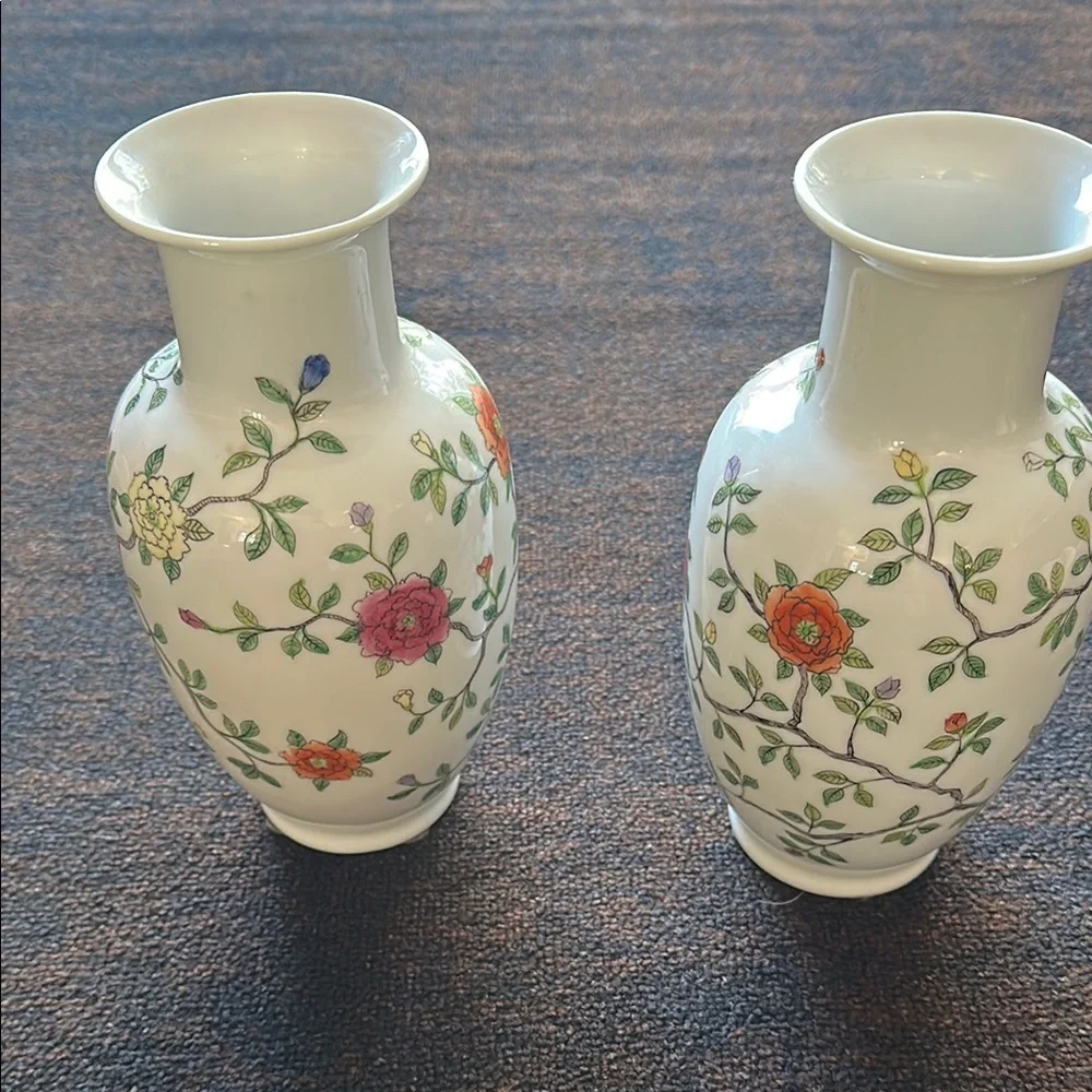 Elegant White Vases with Floral Accents